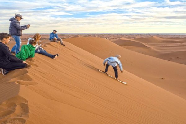 Sandboarding in desert